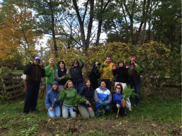 Group photo of volunteers in fall; they are making funny faces.