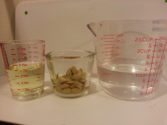 PHOTO: Measuring cups full of supplies, including seeds, bleach, and water.