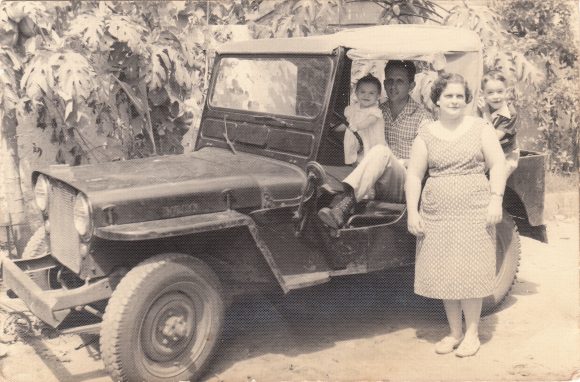 PHOTO: My mother and grandparents and uncle on the family farm in Matanzas province with my grandfather's most memorable purchase: his Jeep.