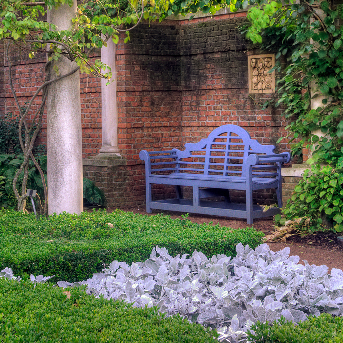 The blue bench in the English Walled Garden at Chicago Botanic Garden