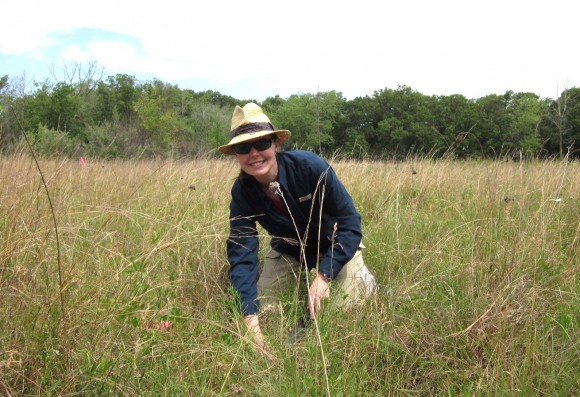 PHOTO: Ksiazek poses for a photo among prairie grasses.