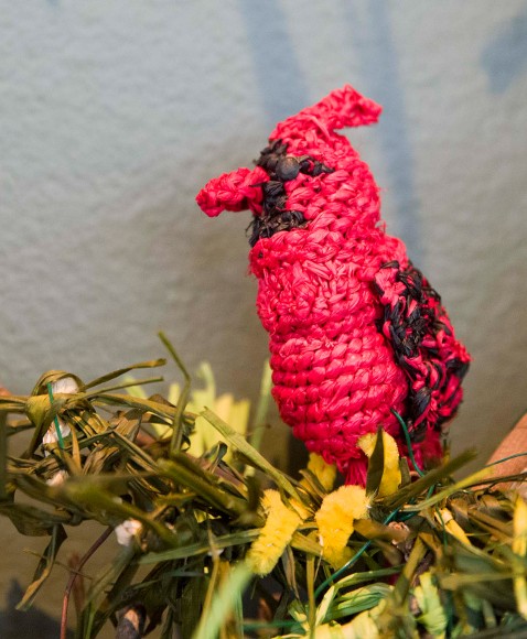 PHOTO: A hand-crocheted raffia cardinal.