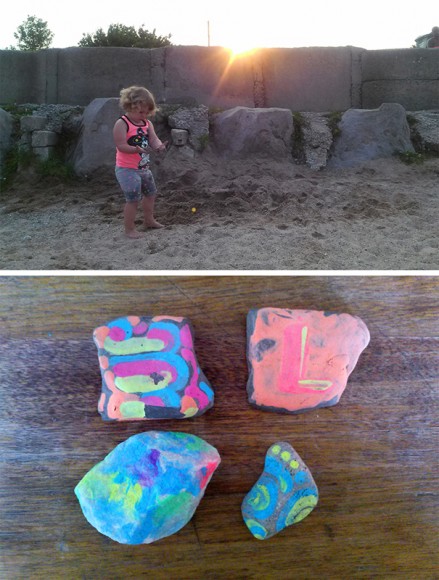 PHOTO: Laila collects stones on the beach; the painted stones below.