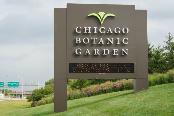PHOTO: Panoramic shot of the garden visible through and behind our sign on the Edens expressway.