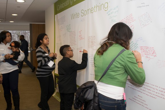 PHOTO: College First participants shared their thoughts and feelings on a mural outside the auditorium.