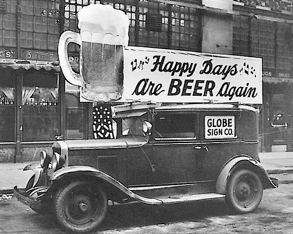 PHOTO: a Post-Repeal Day truck sports a sign with the slogan, "Happy Days are Beer Again!"