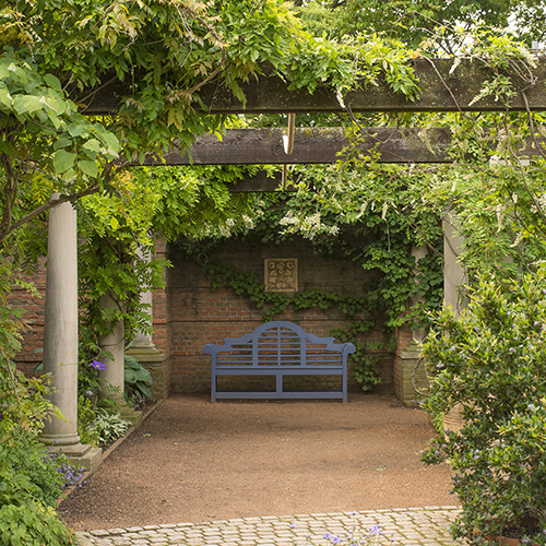PHOTO: The blue bench in the niche at the English Walled Garden.