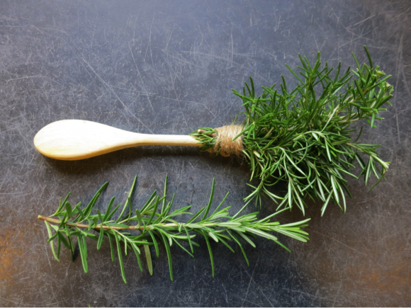 PHOTO: rosemary sprigs tied to a wooden spoon make an herb brush