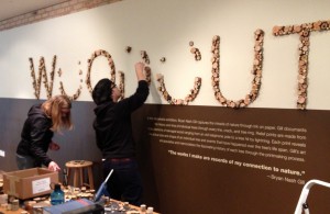 It took 1,022 wood "cookies," 3 people, and 3 blisters to install the exhibition's title.
